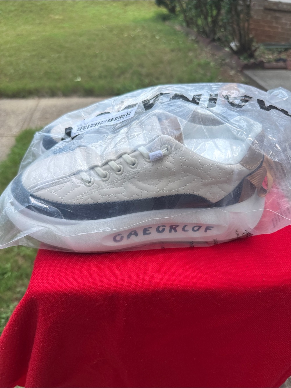 MARINA White Quilted Sneakers with Navy Toe and Tan Heel Tab